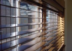 Wooden window blinds.